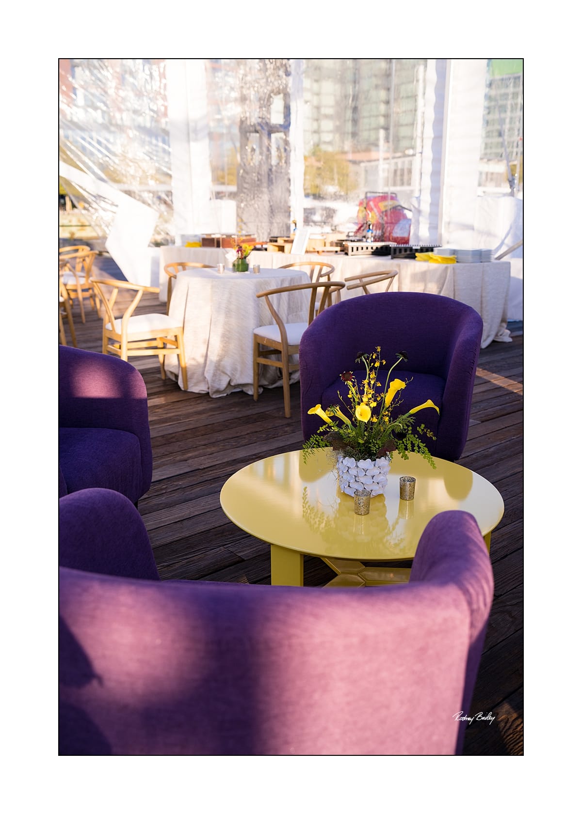 Waterfront lounge furnishings arranged for destination hospitality