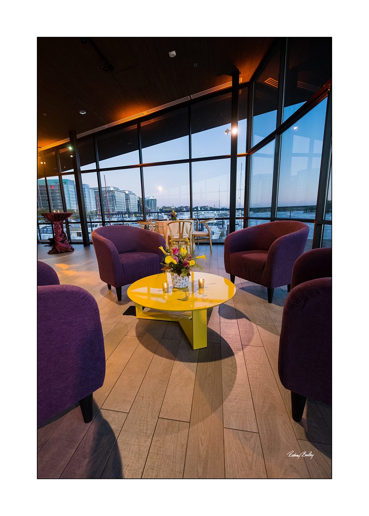 Curated furnishings and styling in a private waterfront lounge
