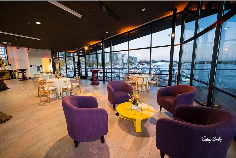Curated private waterfront lounge environment overlooking the venue