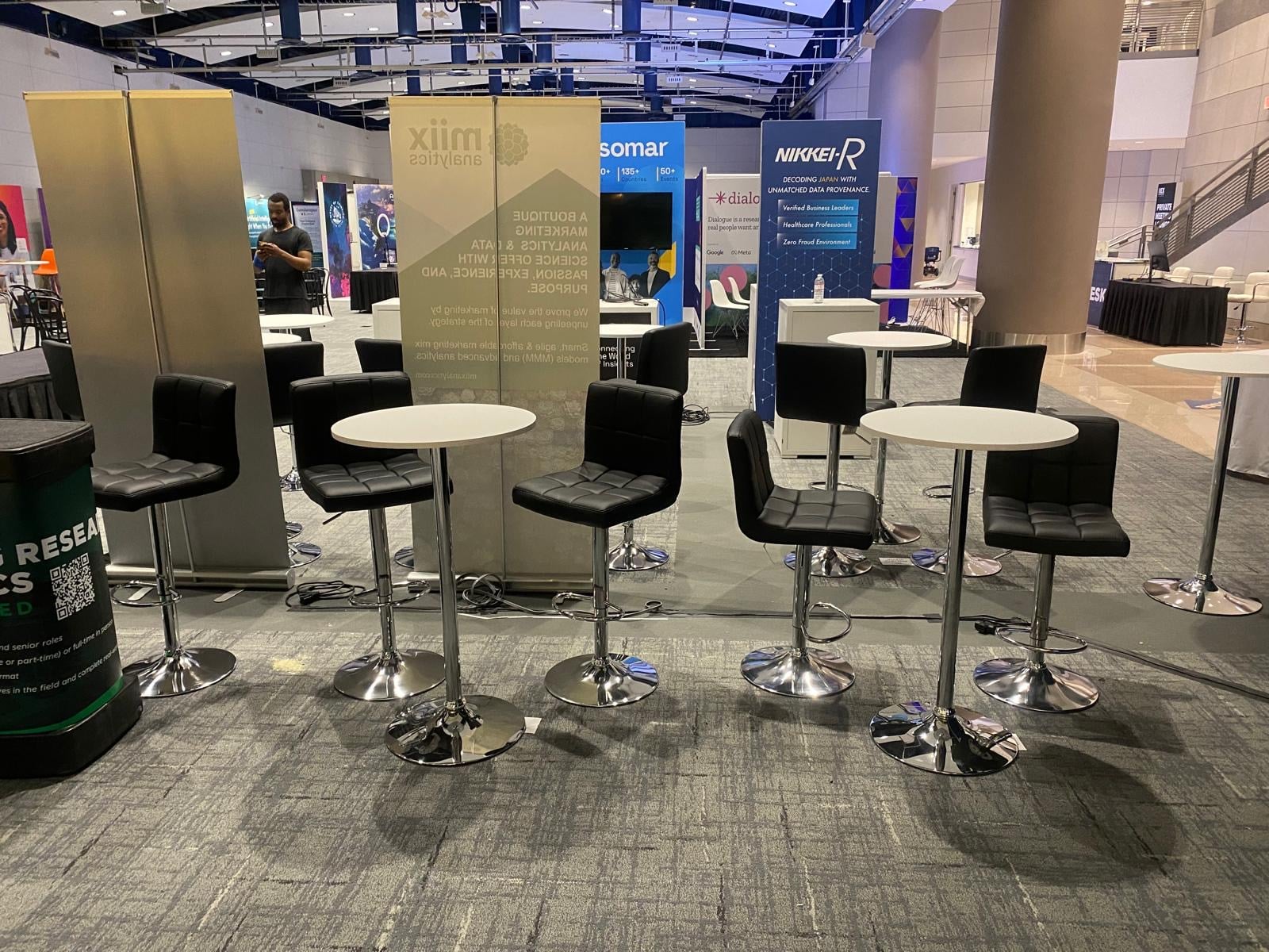 IIEX North America conference lounge with floral accents