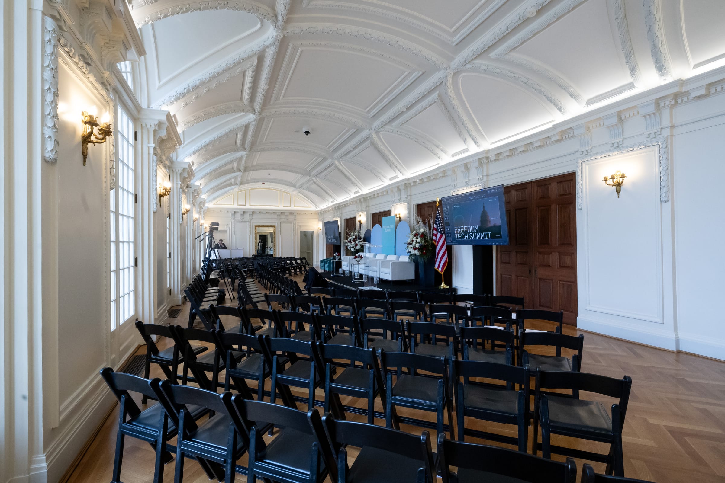 Freedom Tech Summit at DAR O'Byrne Gallery, Washington, DC Freedom Tech Summit seating and stage within the vaulted plaster architecture of DAR O'Byrne Gallery in Washington, DC
