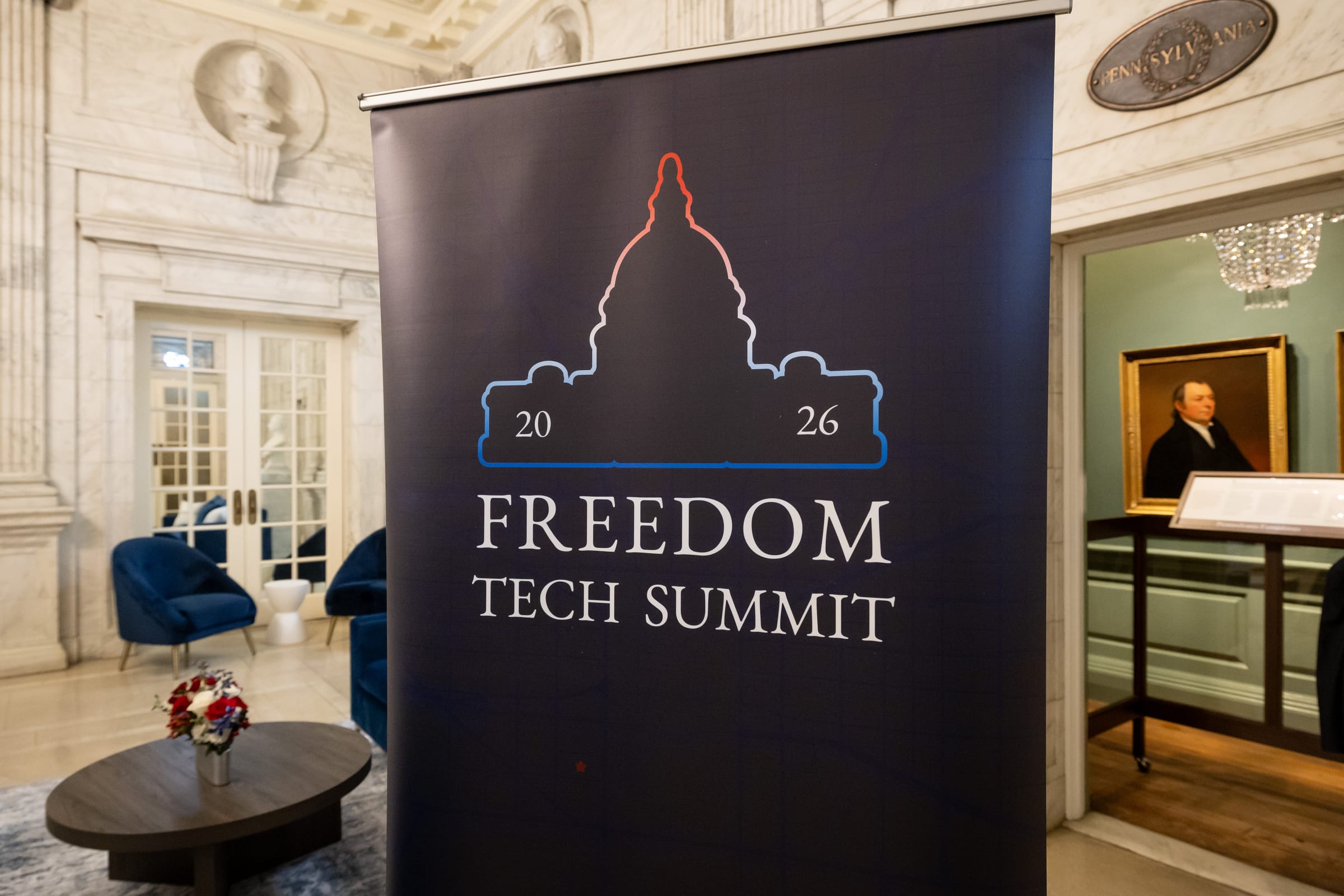 Freedom Tech Summit environmental signage Freedom Tech Summit banner with Capitol dome mark at the entrance to the lounge