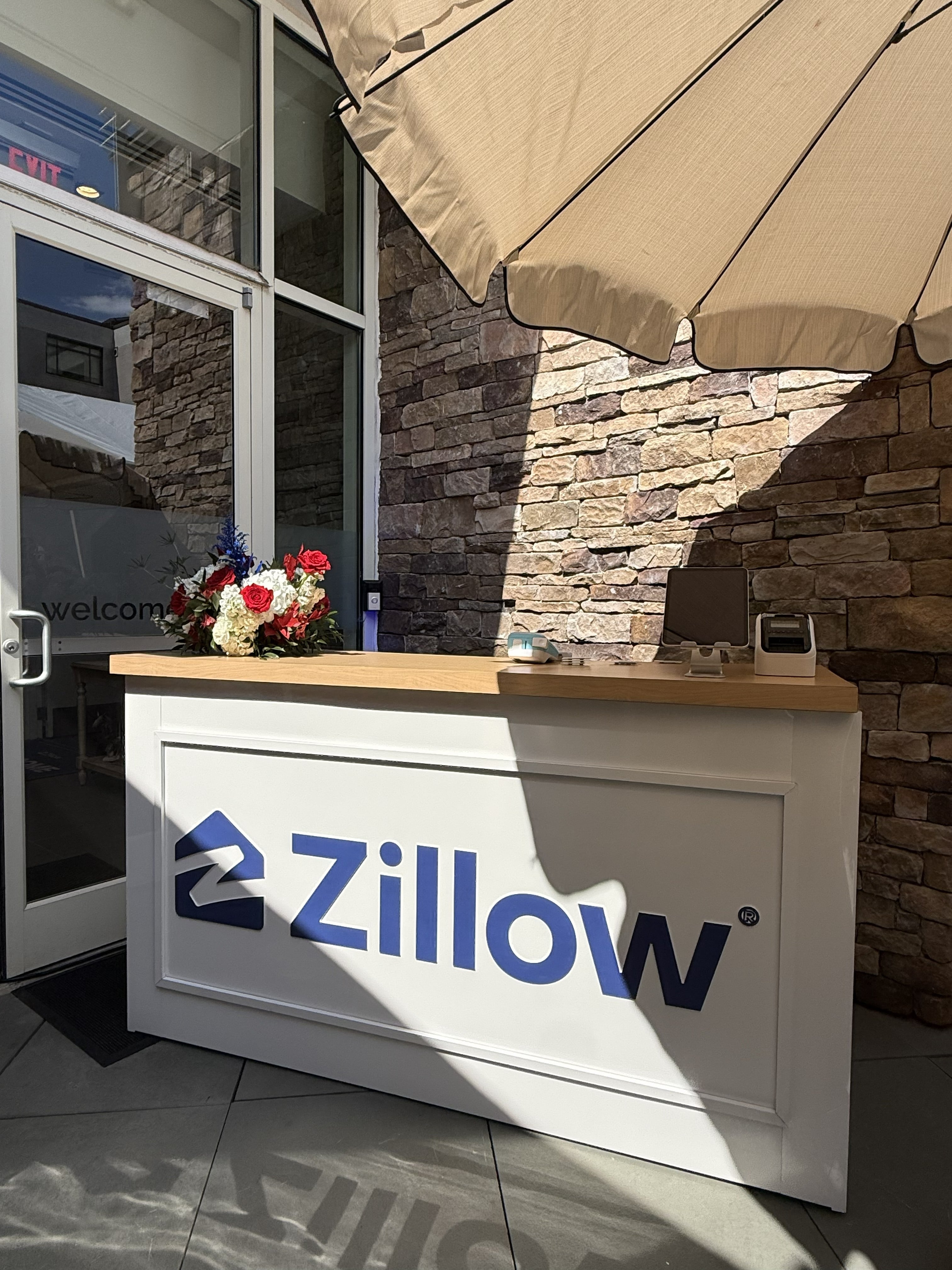 Zillow branded bar façade within the State of Home activation Zillow branded bar façade within the State of Home activation
